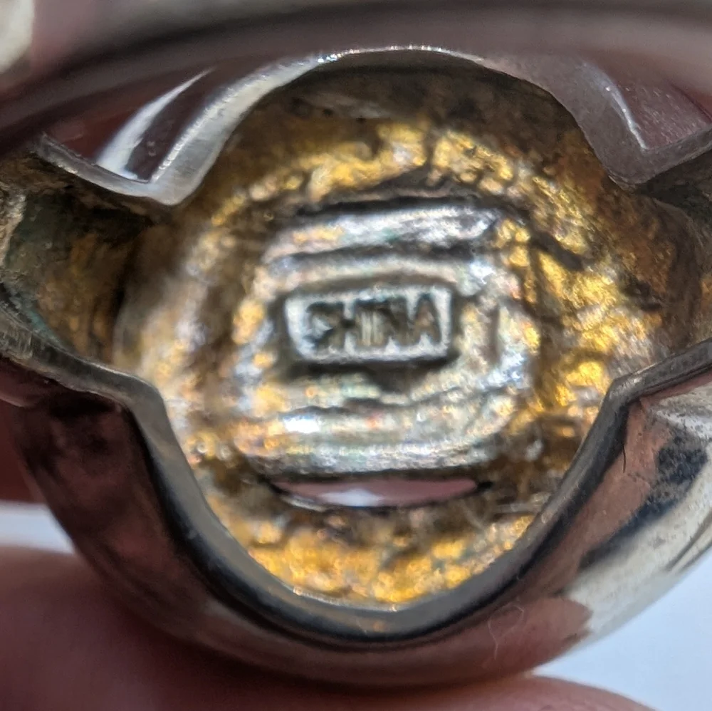 Elegant Silver and Gold-Toned Buckle Ring